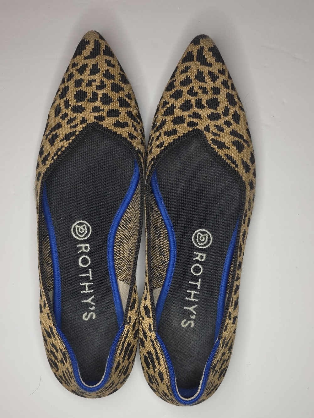 Rothy's Leopard Pointed Flats in Tan and Black with Blue Trim